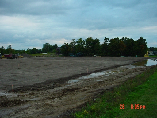 top soil placed  on large fields - tier 1 - final grading in process